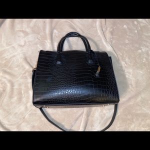 Black faux leather satchel with gold accents